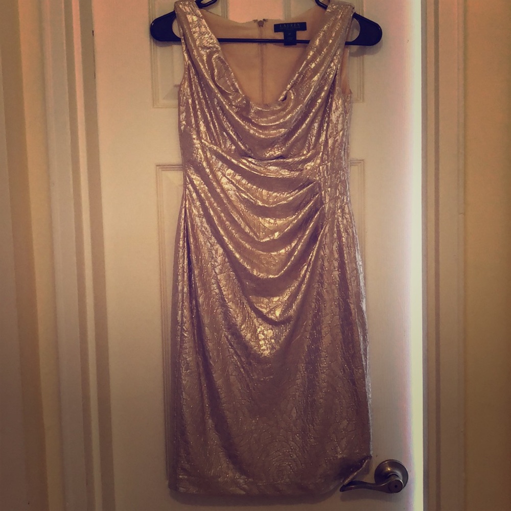 A champagne colored formal dress